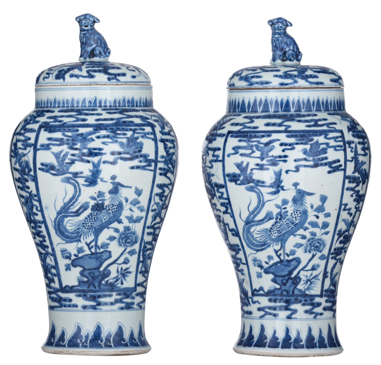 A pair of Chinese blue and white vases and covers, decorated with birds and flowers, 19thC, H 43 cm