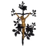 Van Boeckel L., a polished bronze corpus on a wrought iron crucifix with flower decoration, H 80 - W