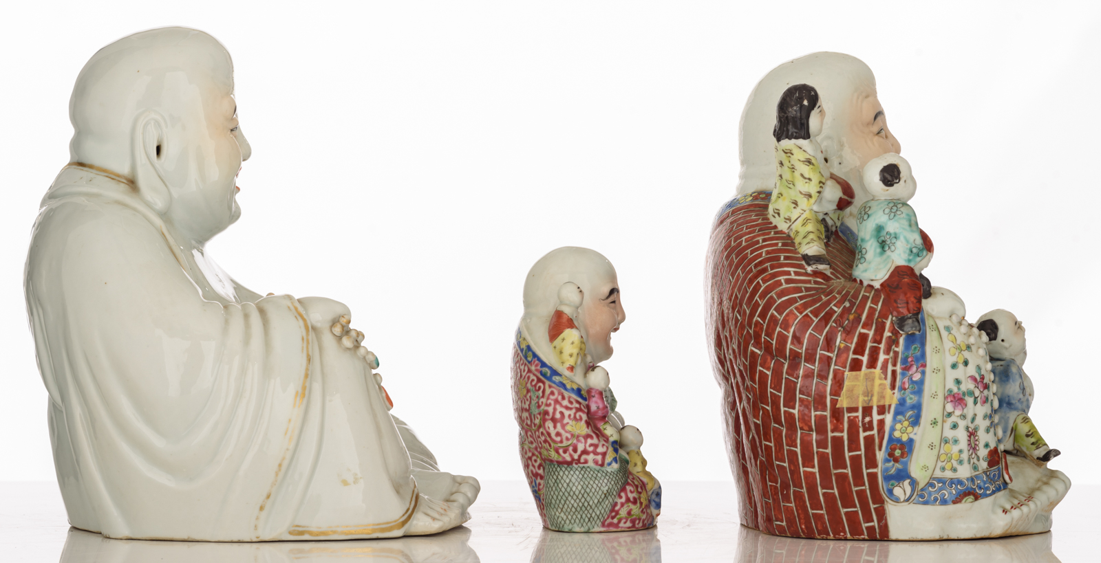 Three Chinese polychrome decorated Budai, two figures holding a chain of praying beads, two figures - Image 4 of 8
