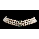 A three strand cultured pearl 'ras du cou' necklace, the 18ct white gold extender set with brilliant