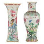 Two Chinese famille rose vases, decorated with birds and flowers on a rock, Qianlong, H 24 - 25 cm