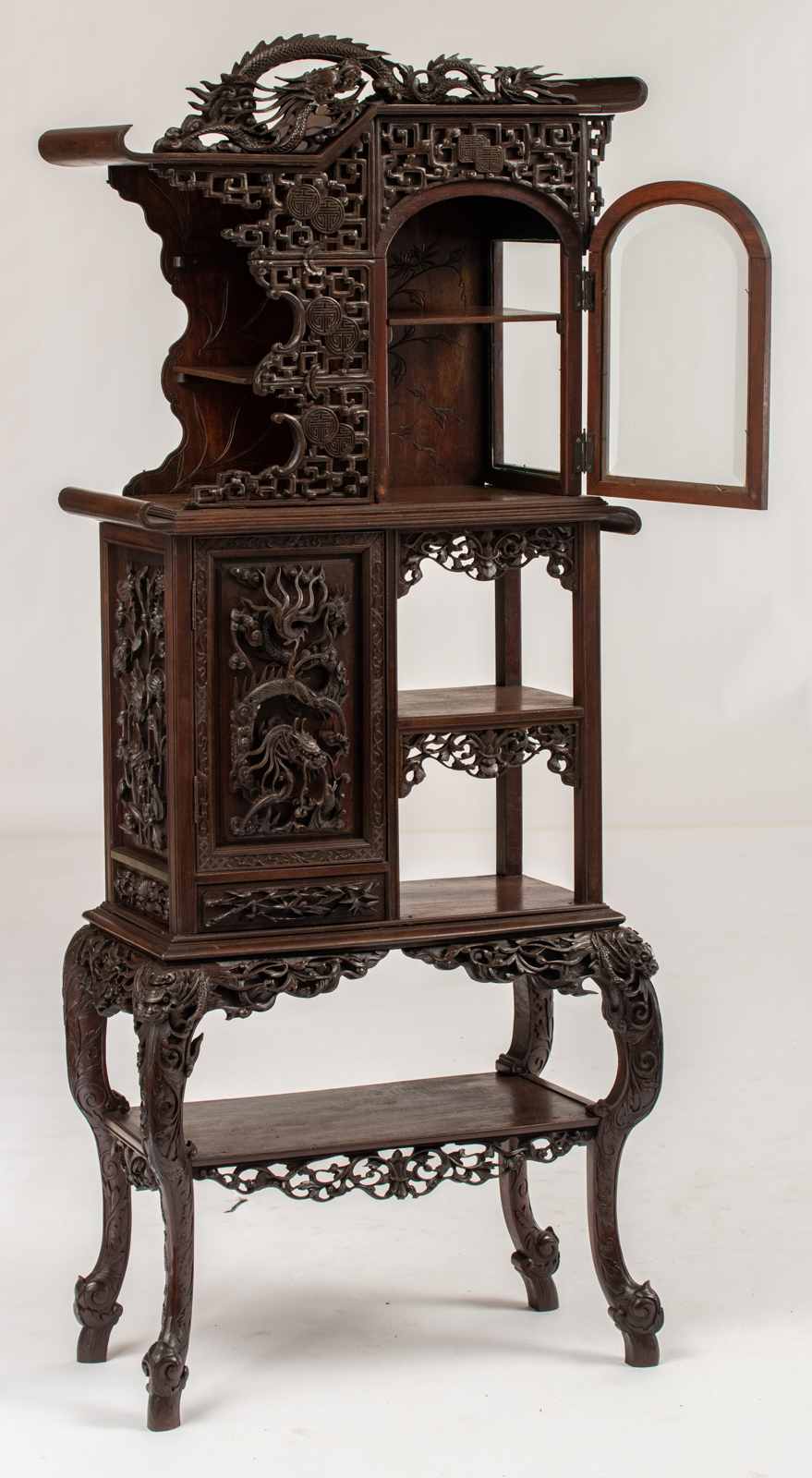 A Chinese exotic hardwood display cabinet, finely sculpted with floral decoration and dragons, H 173 - Image 6 of 6