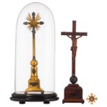 A mahogany veneered and ebonised crucifix, 19thC, H 59 cm; added a Baroque style gilt bronze crucifi