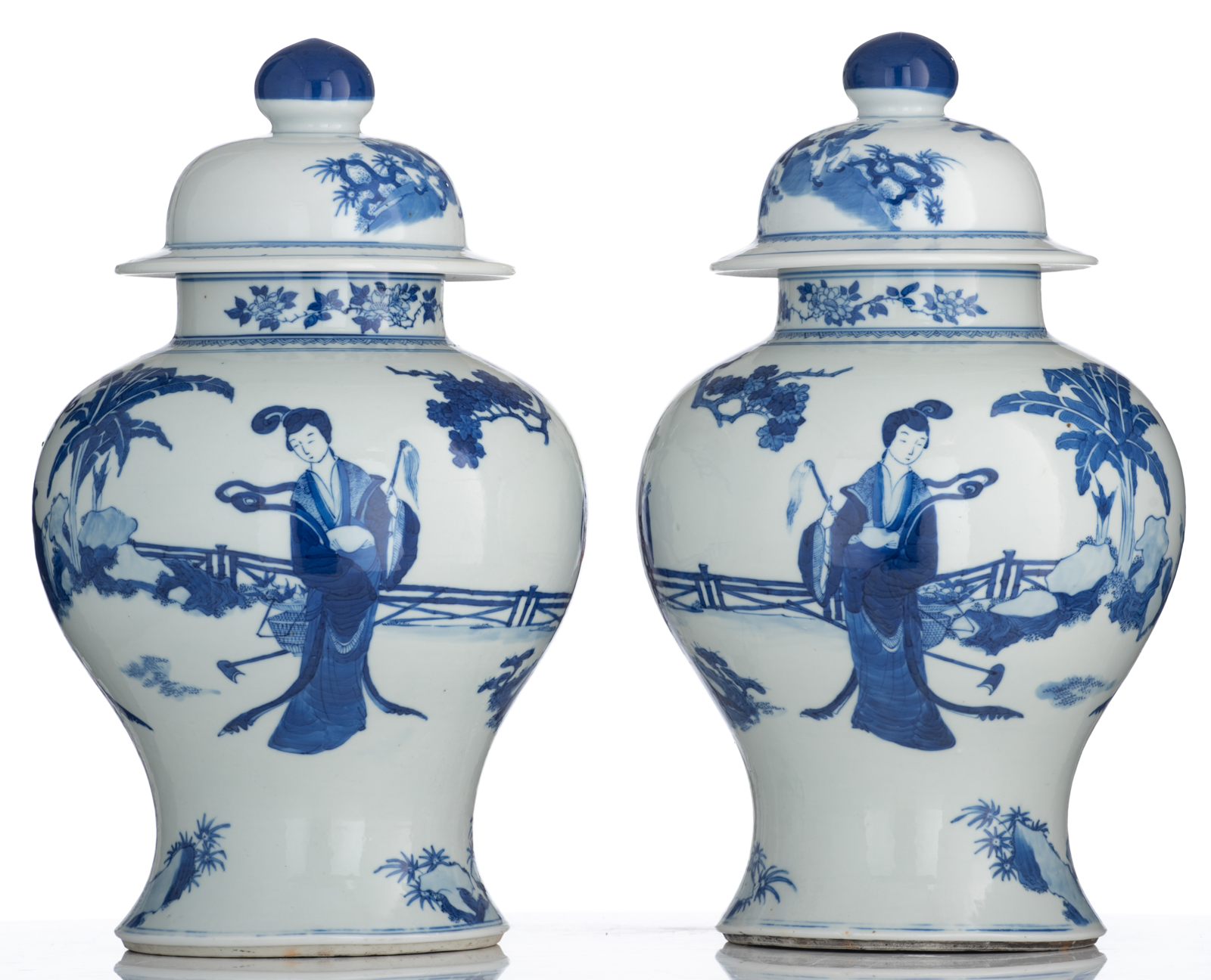 A pair of Chinese blue and white vases and covers, decorated with beauties in a garden setting, 19th - Image 2 of 8