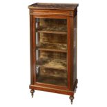 A fine Neoclassical mahogany veneered display cabinet with gilt brass mounts, the inside upholstered
