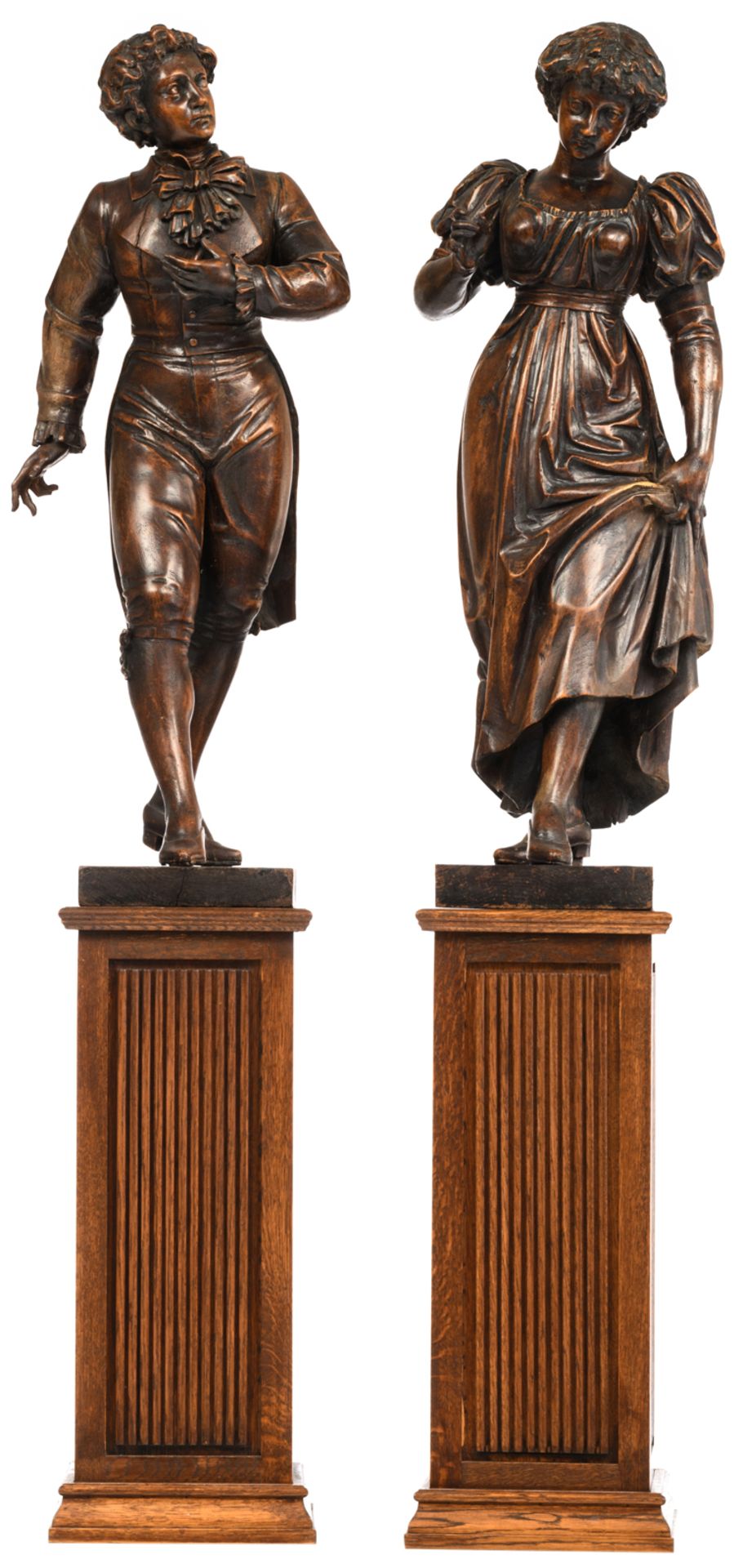 A gallant oak couple on a matching wooden base, early 20thC, H 87 - 147 cm (with base)