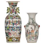 A Chinese famille rose vase, decorated with animated scenes and two dragons, chasing the flaming pea