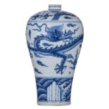 A Chinese blue and white Meiping vase, decorated with phoenix and a dragon among clouds, H 37,5 cm