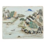 A Chinese famille verte rectangular porcelain plaque, decorated with figures in a mountainous river