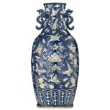 A Chinese blue ground vase, relief decorated with auspicious symbols, 19thC, H 59 cm