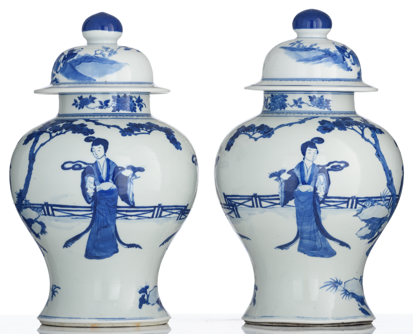 A pair of Chinese blue and white vases and covers, decorated with beauties in a garden setting, 19th - Image 4 of 8