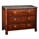 A French Directoire mahogany veneered chest of drawers with gilt bronze mounts and a gris Sainte Ann