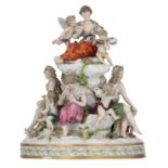 A polychrome painted allegorical porcelain group with beauties and angels, marked Ludwigsburg, 19thC