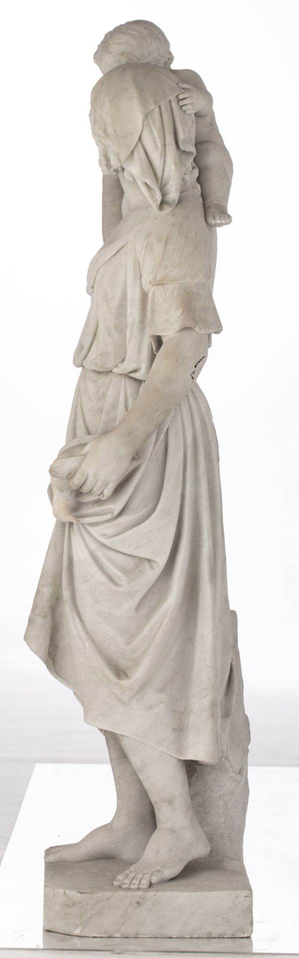 A Carrara marble sculpture of a lady holding a child and a pigeon on a ditto base, H 191 cm (incl ba - Image 2 of 5