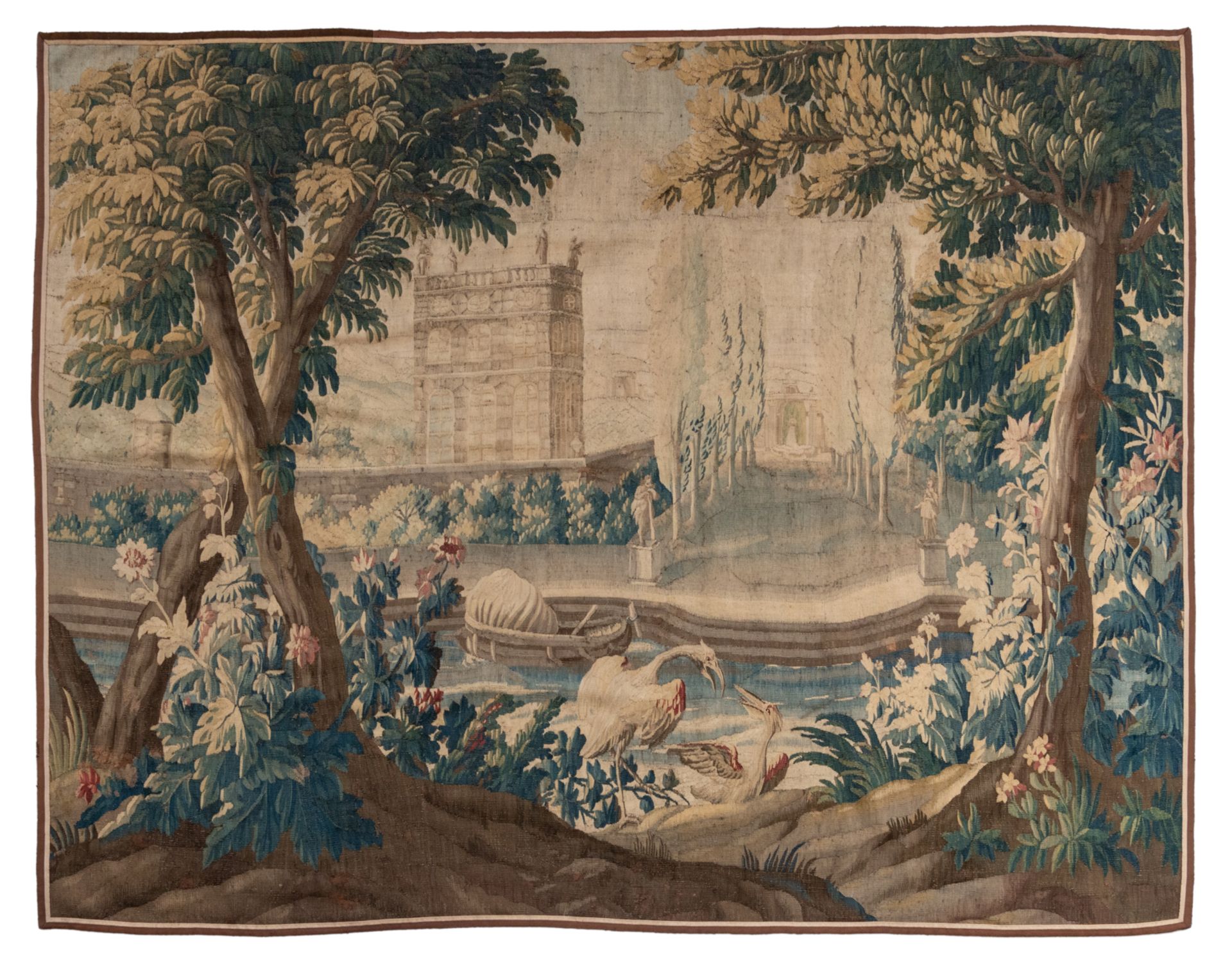 A large verdure wall tapestry, decorated with flamingos in Renaissance garden setting, wool and silk