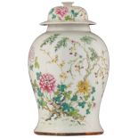 A Chinese famille rose vase and cover, decorated with flowers, flower branches and bats, with a four