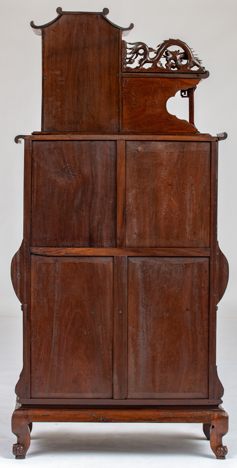 A Chinese inspired exotic hardwood display cabinet, richly sculpted with flowers, bats and dragons, - Image 4 of 5