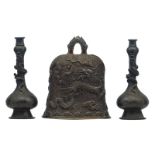 A Chinese bronze ritual bell, relief decorated with dragons, 20thC, H 21 cm; added a pair of Chinese