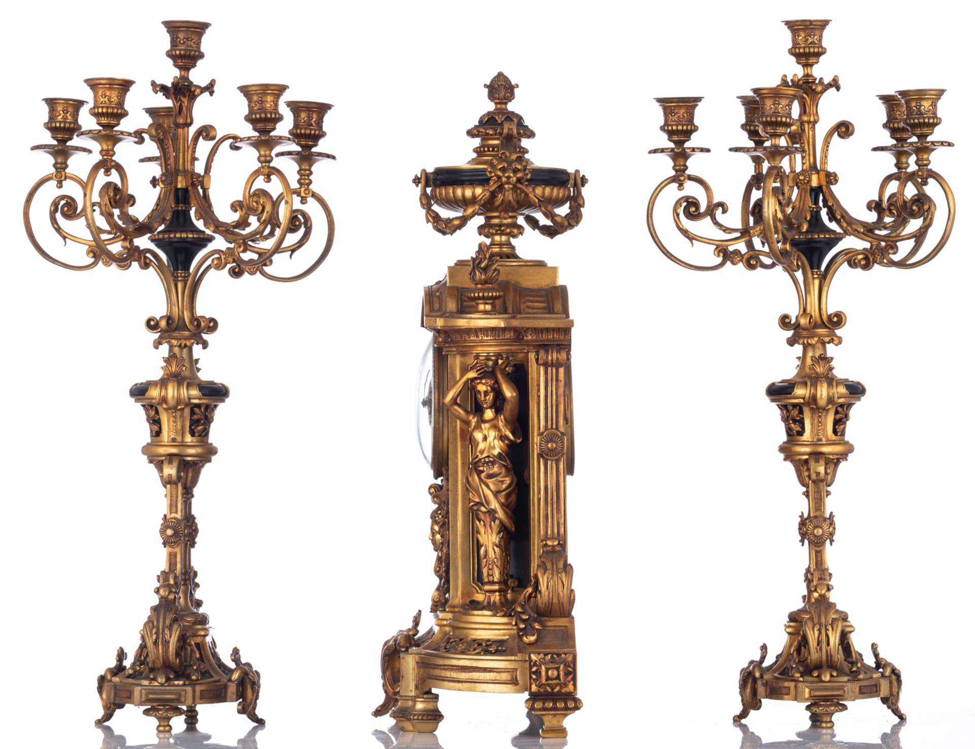 A gilt bronze Baroque inspired three-piece clock garniture, the clock decorated with a trophy on top - Image 2 of 9