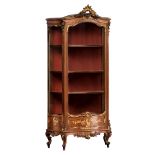A large richly carved and gilt decorated walnut Rococo style display cabinet, the inside upholstered