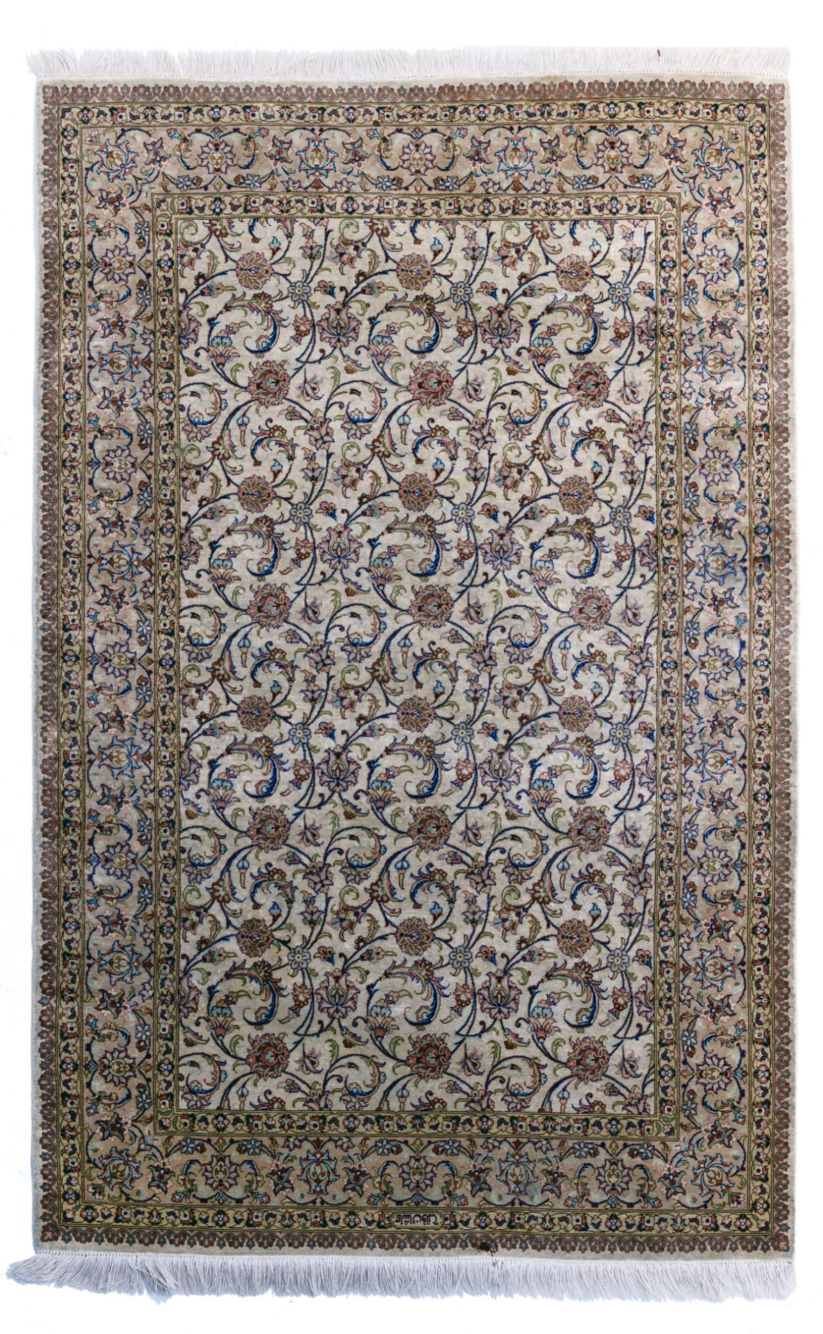 An Oriental silk rug, floral decorated, signed, 154 x 97 cm