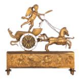 A gilt bronze Neoclassical pendulum clock with on top a cupid riding a chariot, the base decorated w