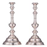 A pair of late 19th / early 20thC. Austro-Hungarian - Vienna 800/000 silver candlesticks, the body e