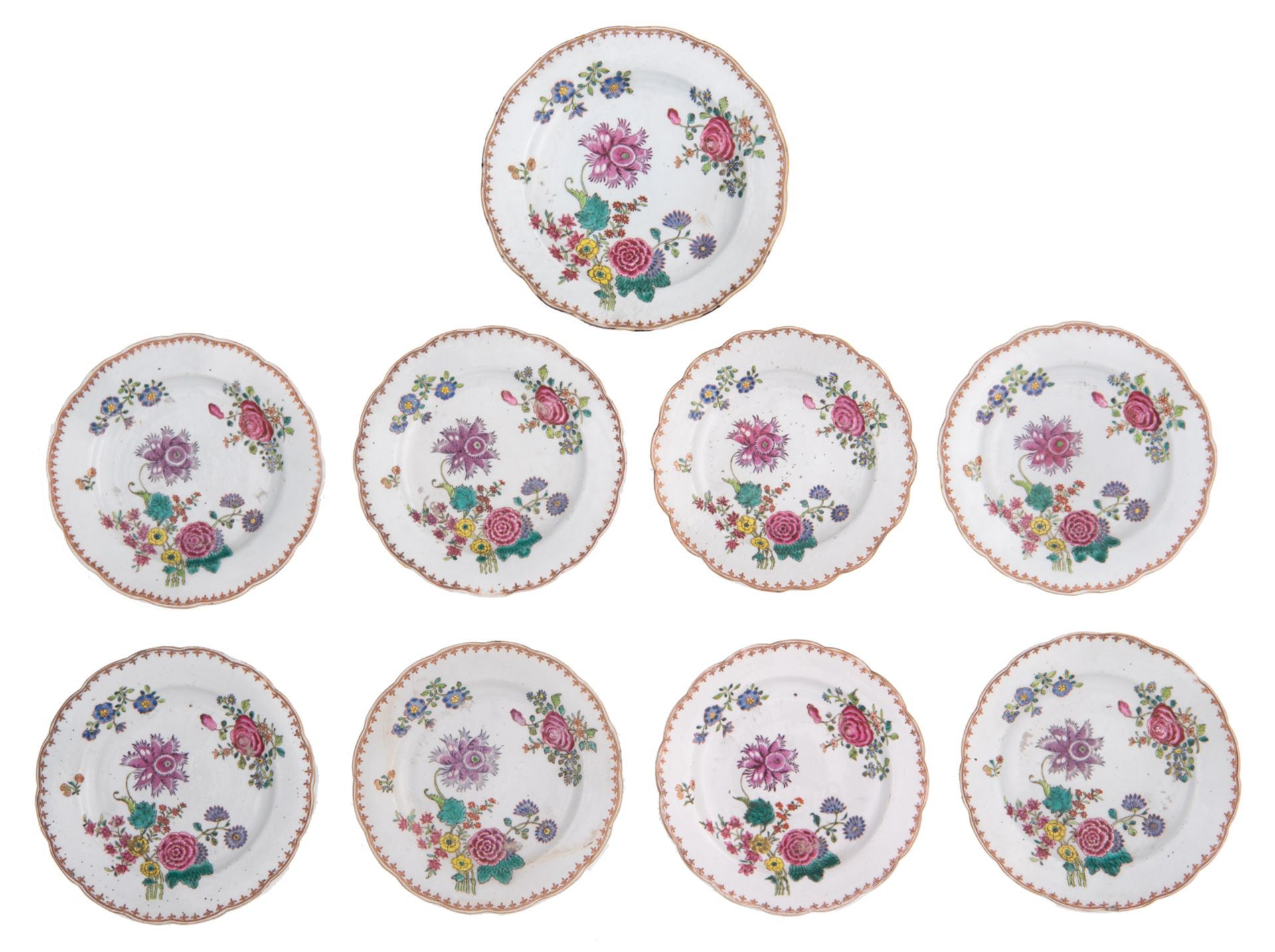 Eight Chinese famille rose dishes, the centre floral decorated; added a ditto larger dish, 18thC, ø