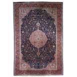 A fine Oriental woollen carpet, floral decorated, 333 x 492 cm