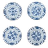 Four Chinese blue and white floral decorated dishes, Kangxi period, ø 21,5 cm