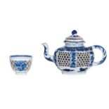A Chinese double wall teapot and ditto cup with openwork of honeycombs and navettes, decorated in un