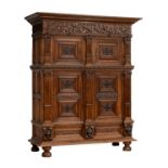 A Dutch-Zeelandic oak four-doors cupboard, all over richly sculpted with Renaissance scrollwork and