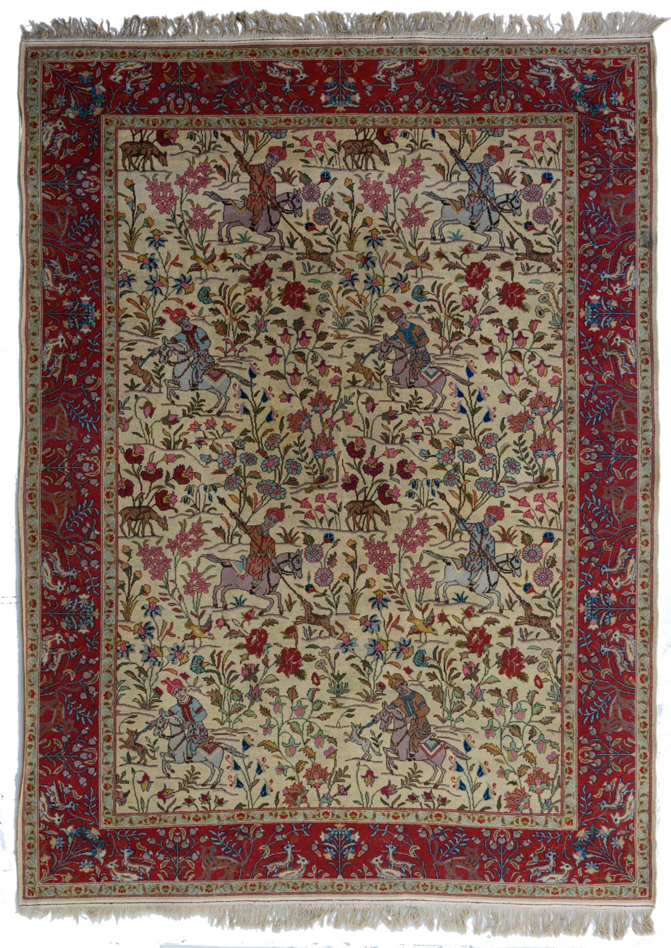 An Oriental woollen rug, decorated with hunting scènes to the center, and with animals and floral mo - Image 3 of 9