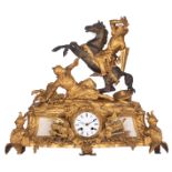 A gilt and patinated bronze mantle clock 'à sujèt', on top a crusader fighting a Moorish soldier, de