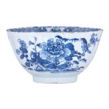 A Chinese blue and white lobed bowl, the front and reverse decorated with a bird and peony branches,