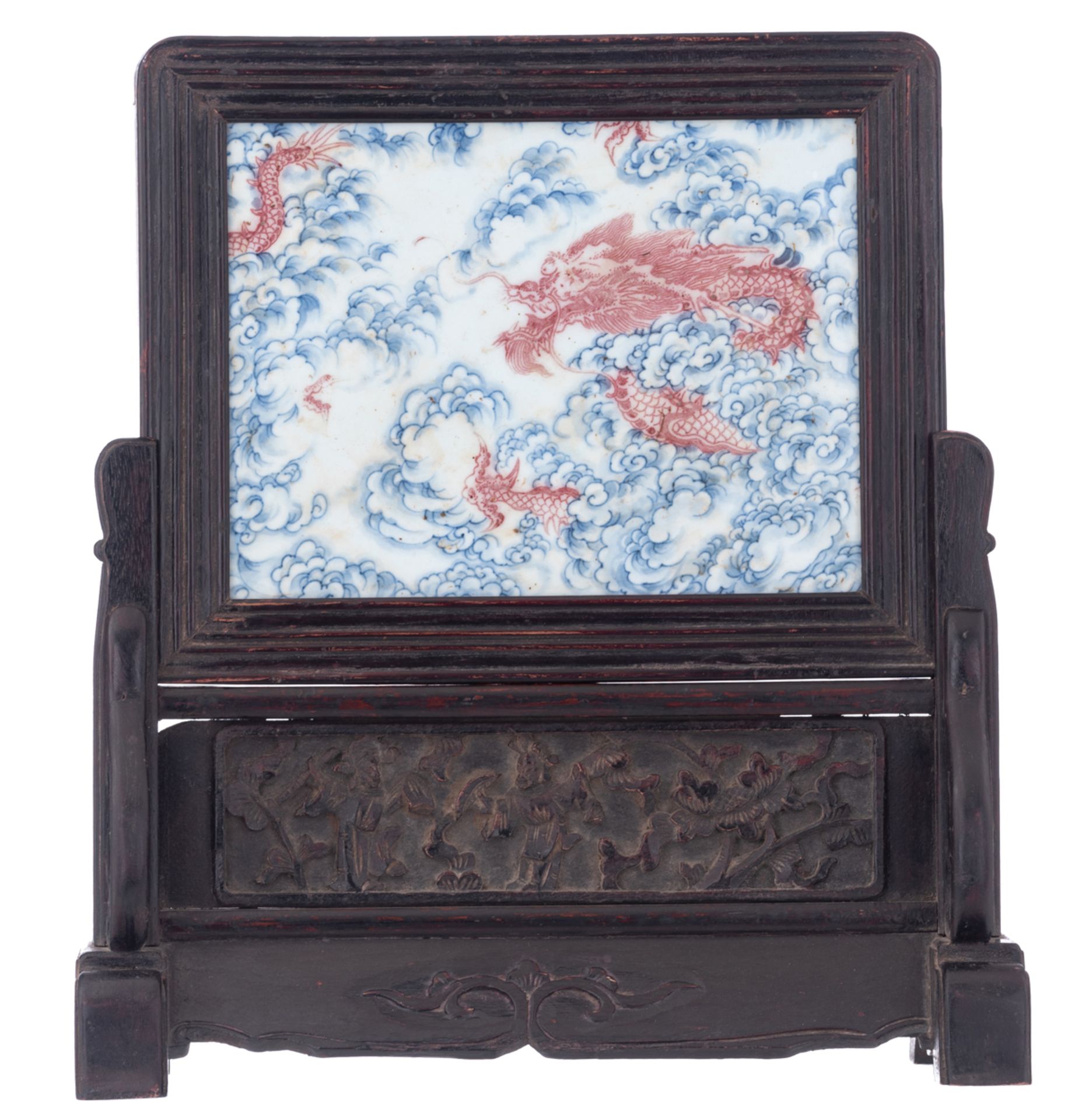 A Chinese rosewood table screen with a blue and white, and underglaze copper-red decorated porcelain