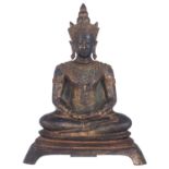 An Oriental gilt bronze seated figure of a Buddha in meditation, with semi-precious stone inlay, H 3