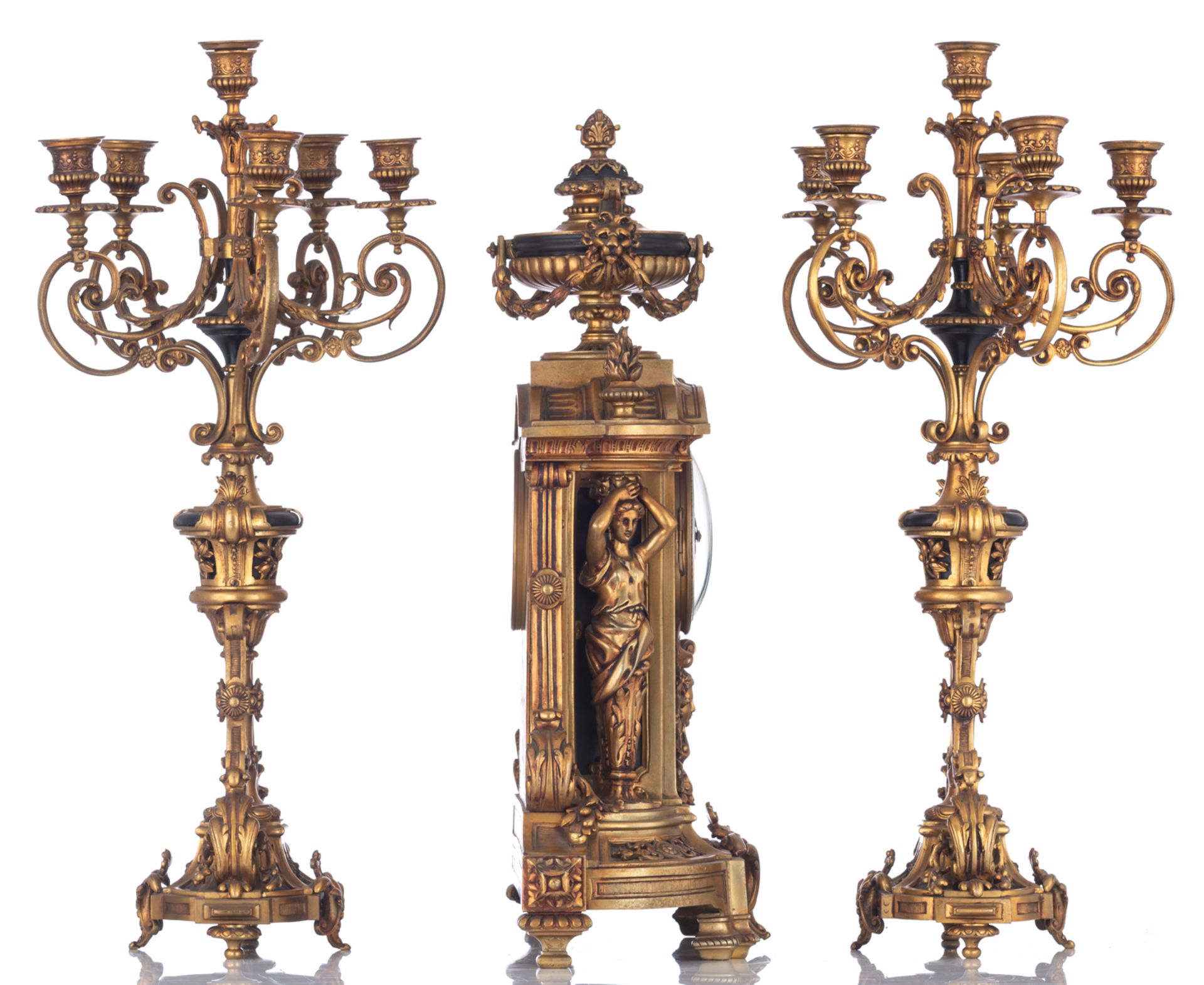 A gilt bronze Baroque inspired three-piece clock garniture, the clock decorated with a trophy on top - Image 4 of 9