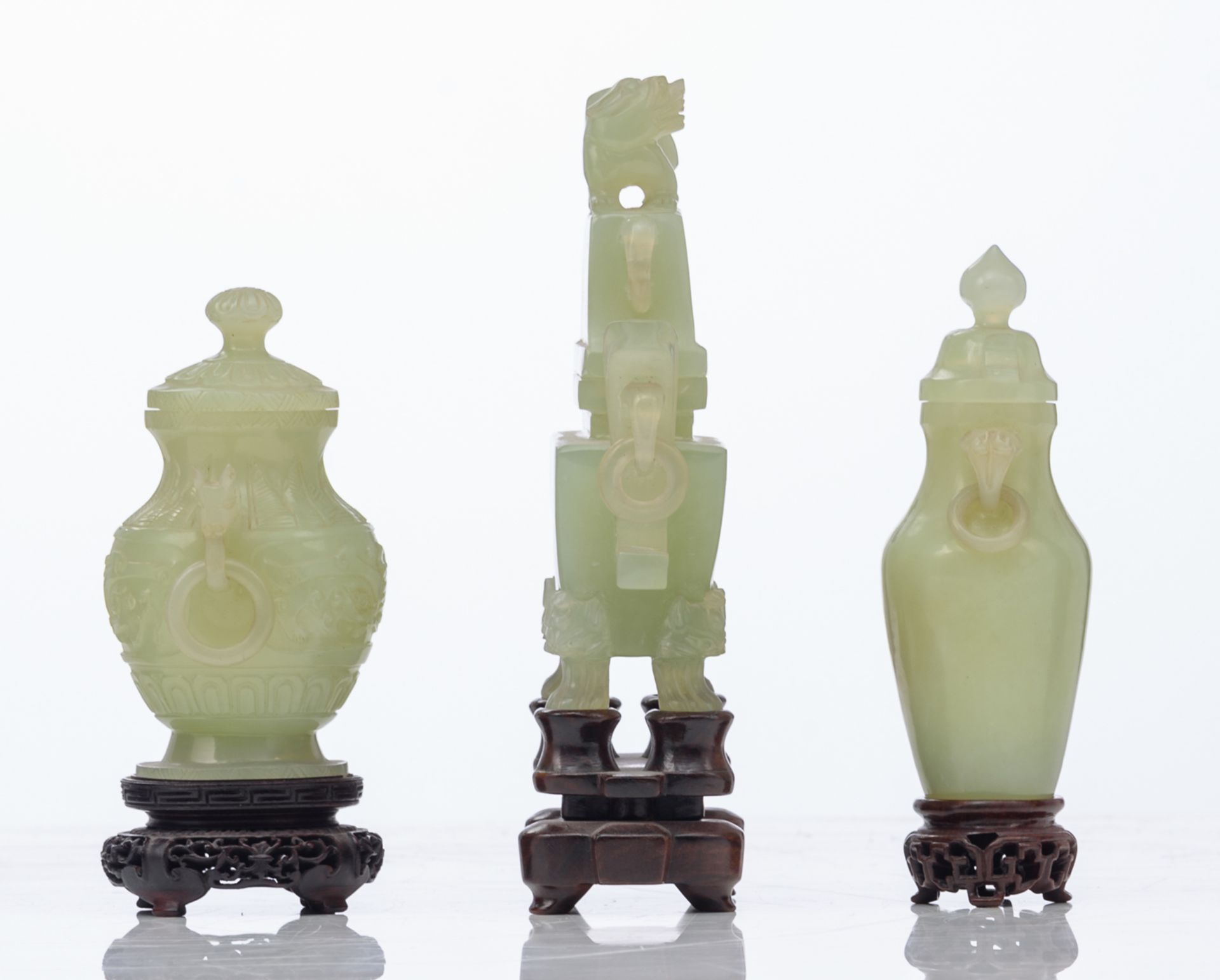 Three Chinese carved green jade vases and covers, Qing dynasty; added a Chinese carved smoky quartz - Image 6 of 14