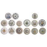 A collection of fourteen large polychrome and blue & white decorated Dutch Delftware and Northern Fr