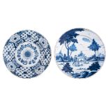 A blue and white decorated Dutch Delftware plate, depicting a pastoral scene, 18thC, ø 36 cm; added