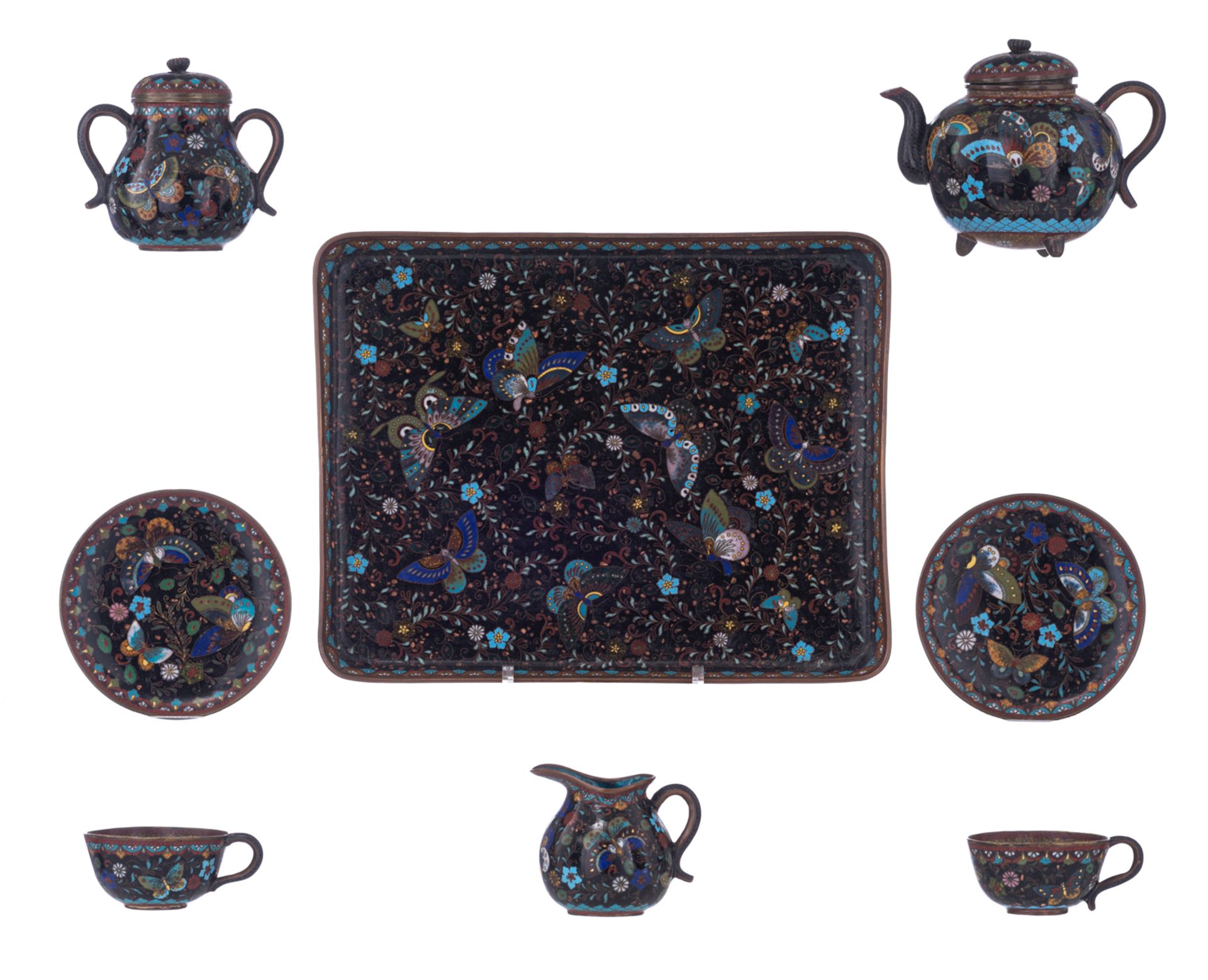 A Japanese cloisonné enamel tea set, i.e. a tray, two cups and saucers, a teapot and cover, a milk j