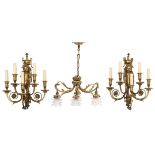 A fine pair of Neoclassical ormulu bronze wall lamps, with putti holding the floral-shaped arms of t