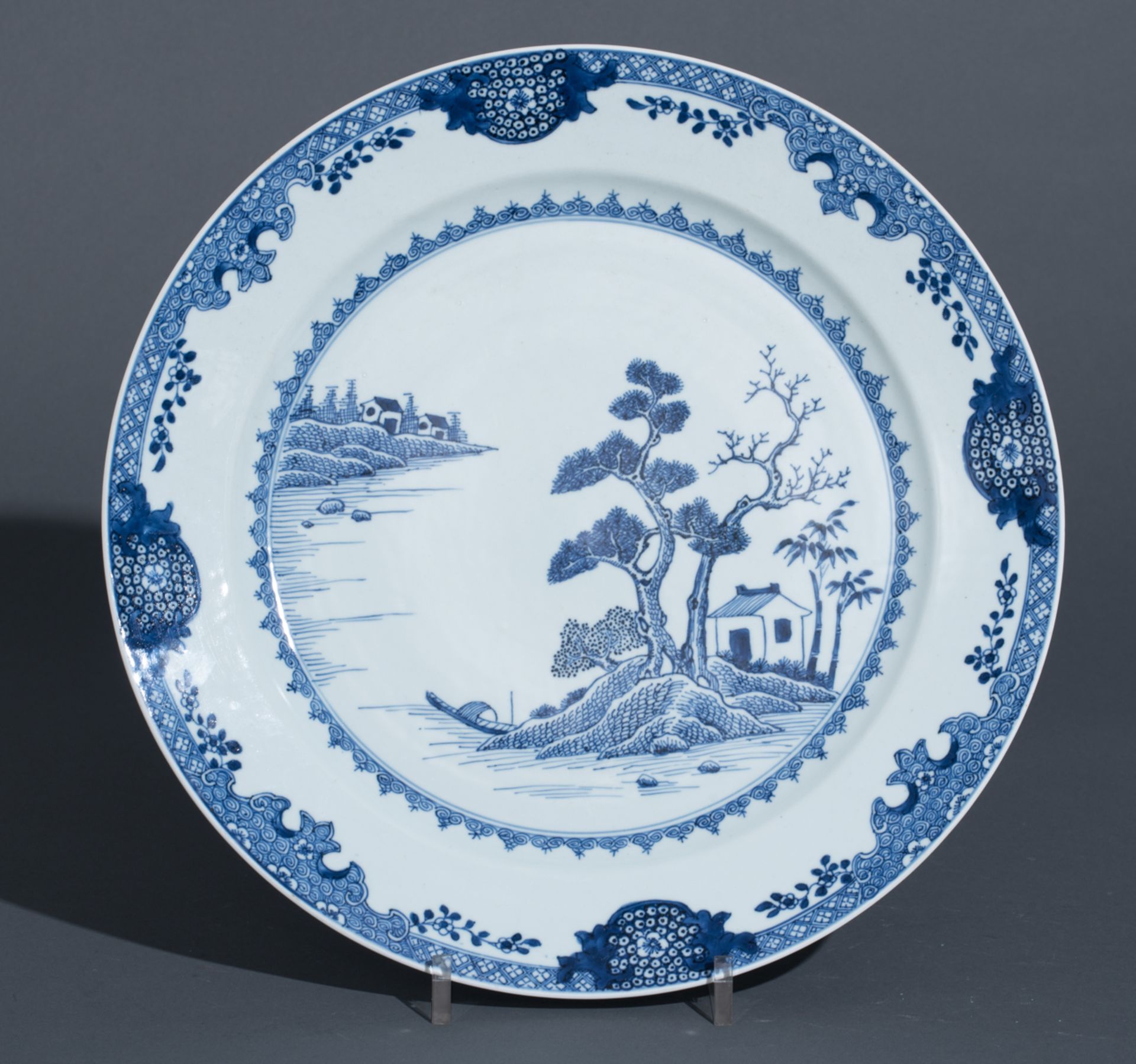 A Chinese blue and white export porcelain plate, decorated with a pavilion in a river landscape, 18t - Image 2 of 3