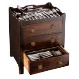 A mahogany cutlery chest containing a compound Rococo-model mix of 800/000 silver cutlery, produced