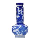 A Chinese 'Peking glass' blue and white bottle vase, relief decorated with qilins, H 22,5 cm