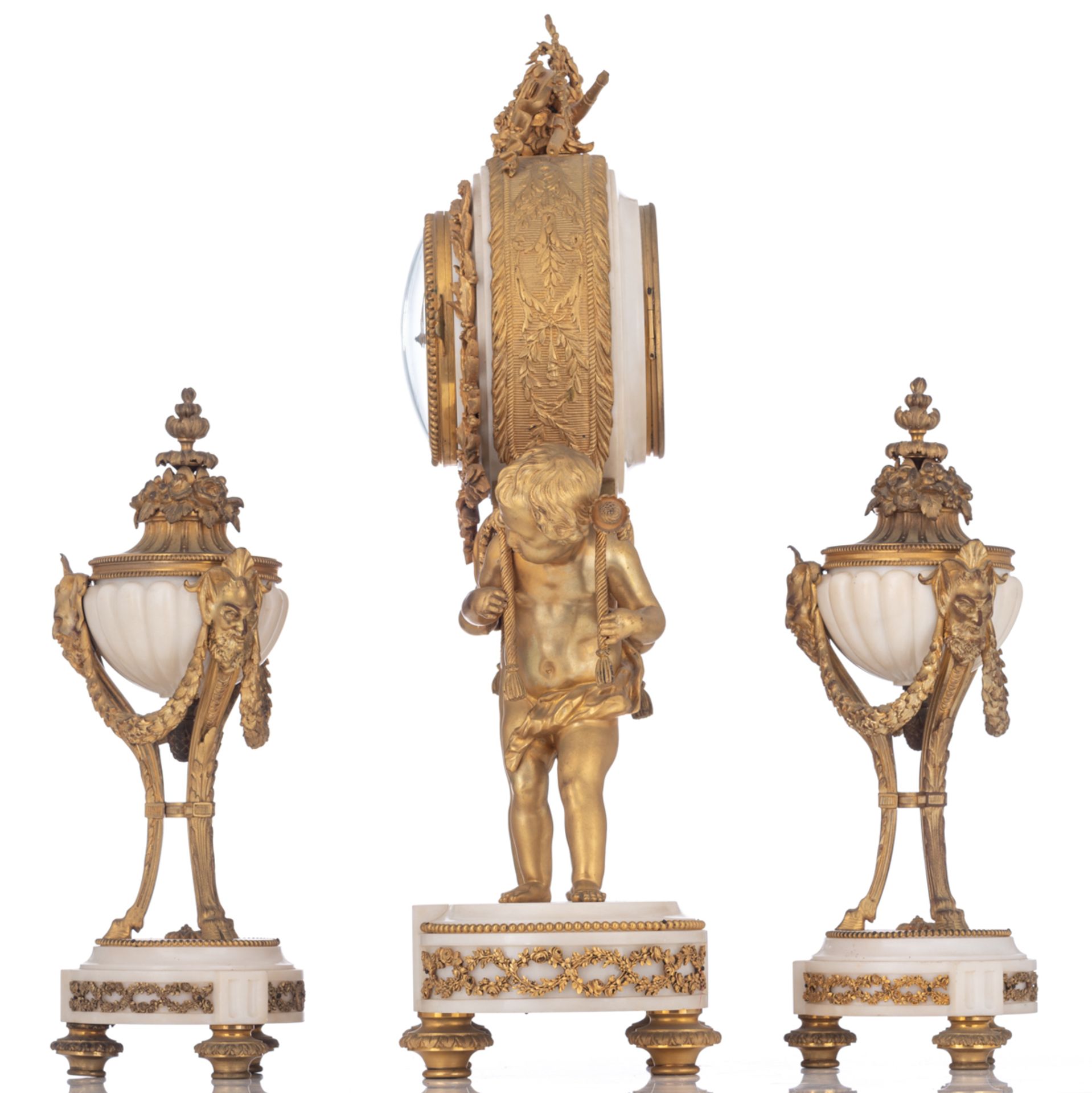 A Neoclassical Carrara marble and gilt bronze three-piece mantle clock garniture, decorated with two - Image 2 of 9