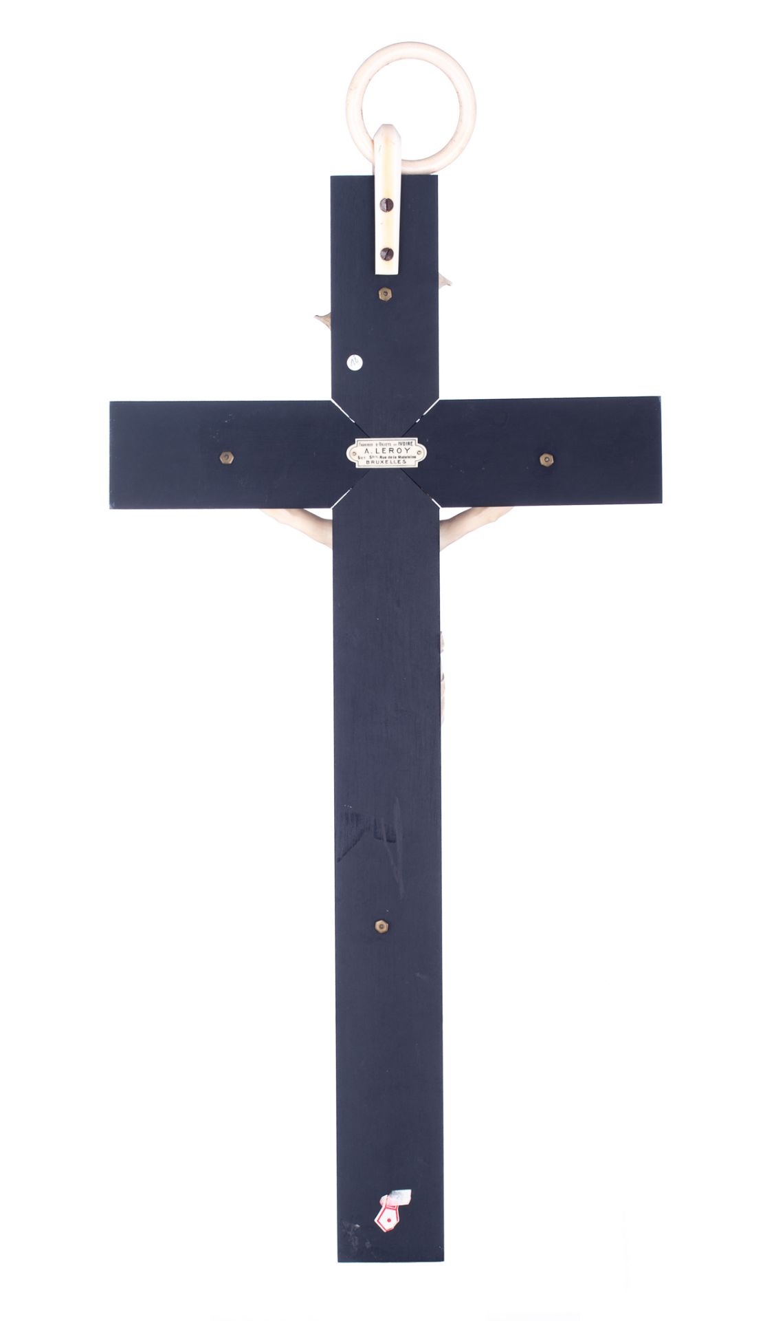 A finely sculpted ivory Corpus Christi on an ebony crucifix with an ivory hanging ring on top, 19thC - Bild 2 aus 3