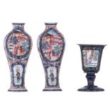 Two Chinese Mandarin pattern export porcelain vases, the roundels decorated with figures on a terrac