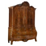 A large and imposing mahogany veneered Dutch Neoclassical cabinet, decorated with gilt bronze mounts